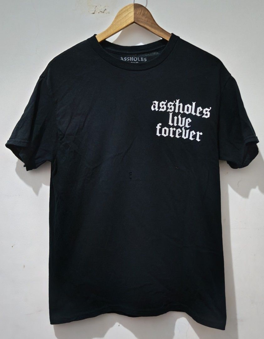 Assholes Live Forever Statement (Category: Tshirts & Polo Shirts ) located in Taguig. Submitted by thriftedminds (Listing ID 1467220032, Image 2). Description: Item: Assholes Live Forever (Statement Tee)🔥 ‎Size: Medium (Assholes Live Forever) ‎Width: 19 ‎Length: 27.5 ‎Condition: Excellent ‎Issue: Pinhole DM to purchase 📩.