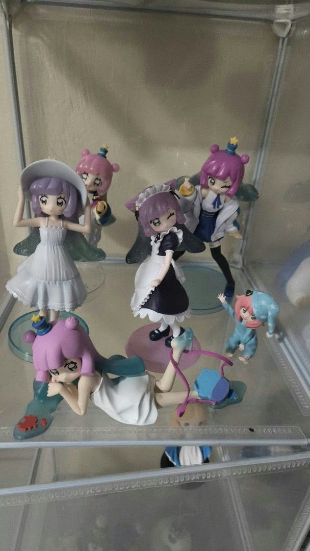 Assorted anime character collectible figures display set (Category: Figurines & Statues) located in Leyte. Submitted by tmoperao (Listing ID 1467217116, Image 1). Description: - Collection of various anime figures in different poses and outfits (maid, casual, sleepwear) - Vibrant multicolored hair styles (purple, pink, and more) - Stands included with every piece - Kept safe and secure on glass shelves - Ideal for anime merchandise collectors - A