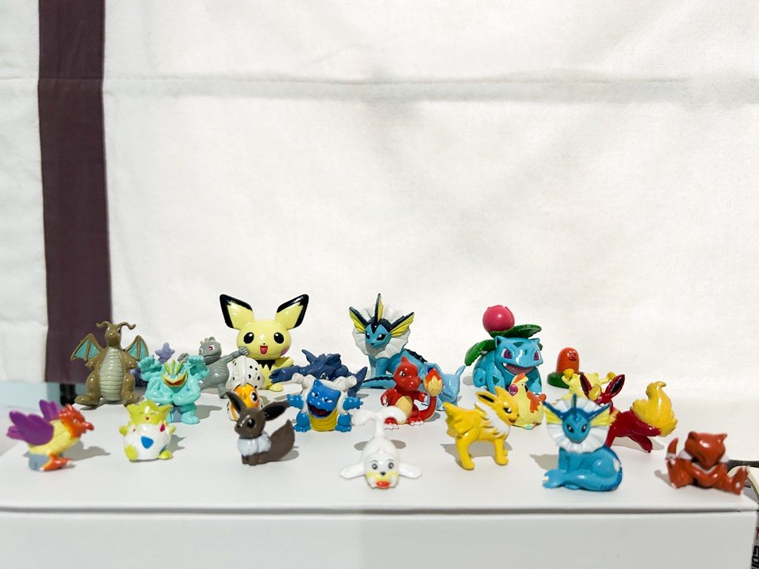 Assorted Pokémon Mini Figures Set (Category: Figurines & Statues) located in Cainta. Submitted by unboxingstuff (Listing ID 1467231383, Image 2). Description: - Pokémon mini figure bundle set - 3 (Pichu, Vaporeon, Ivysaur) in about 2 inches height; the rest is about 1 inch - Includes characters like Pikachu, Vaporeon, Ivysaur, Charmander, Blastoise, and others - Features great paint details on each figure - Perfect for collectors or desk display 