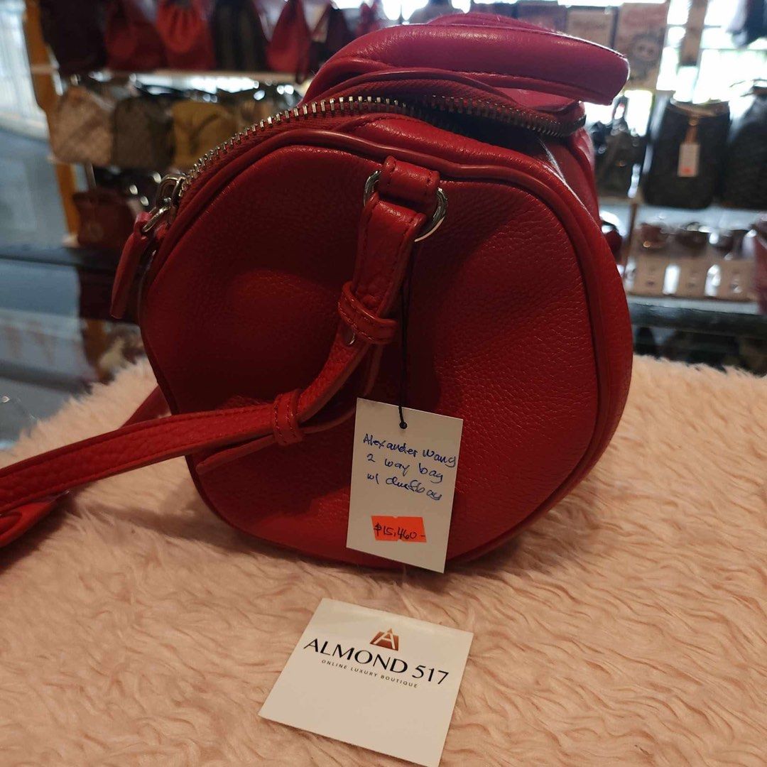 AUTHENTIC ALEXANDER WANG 2-WAY ROCKIE BAG (Category: Luxury Bags & Wallets) located in Pasig City. Submitted by the_queen_bee (Listing ID 1467260882, Image 2). Description: Bought for 15K+ in ALMOND 517 LUXURY store in Serendra last June 2025 Clean, no issue. With dustbag Pebbled lambskin Alexander Wang “Rockie” bag with duffle silhouette. Short leather top handles, with an optional shoulder strap, and silver studded base and hardware. Grey fabri
