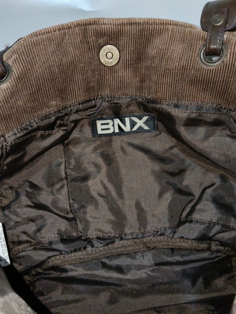 Authentic BNX Bag 🤎 (Category: Tote Bags) located in Cagayan de Oro. Submitted by warmbird-f84aab (Listing ID 1467213810, Image 3). Description: ✅ Original BNX from Korea ✅ Brown monogram design, very timeless ✅ Corduroy material, feels premium ✅ Malinis ang loob, maganda pa ang condition — minor signs of use lang ✅ Spacious — perfect for work, school, or OOTD bag 💰 Price: 550 📍 Mindanao ⚠️ NO RETURN / EXCHANGE 📩 DM me if interested! First to