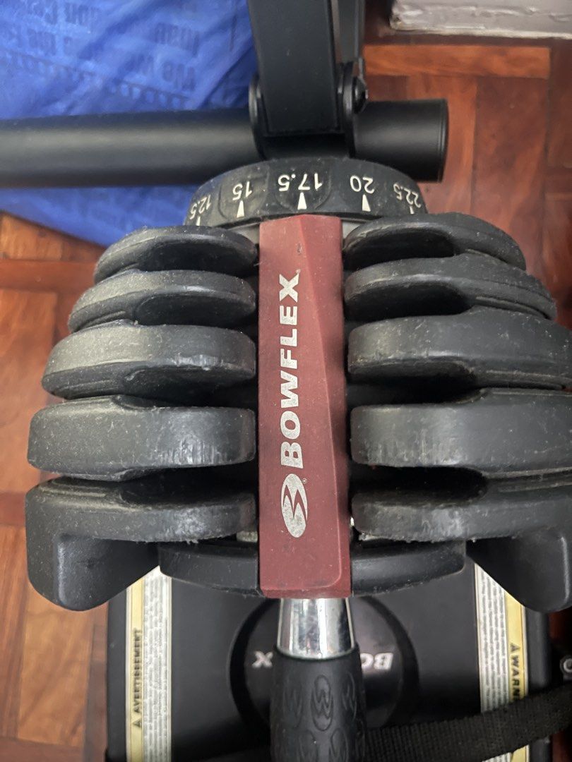 Authentic Bowflex SelectTech 552 Adjustable Dumbbells (Pair) – Good Condition (Category: Weights & Dumbbells) located in Makati City. Submitted by mathew.cloud (Listing ID 1467228719, Image 3). Description: Selling a genuine, pre-owned pair of Bowflex SelectTech 552 Adjustable Dumbbells. These are excellent space-savers for any home gym setup, replacing 15 pairs of traditional weights in a single compact footprint. Product Condition & Details: • 
