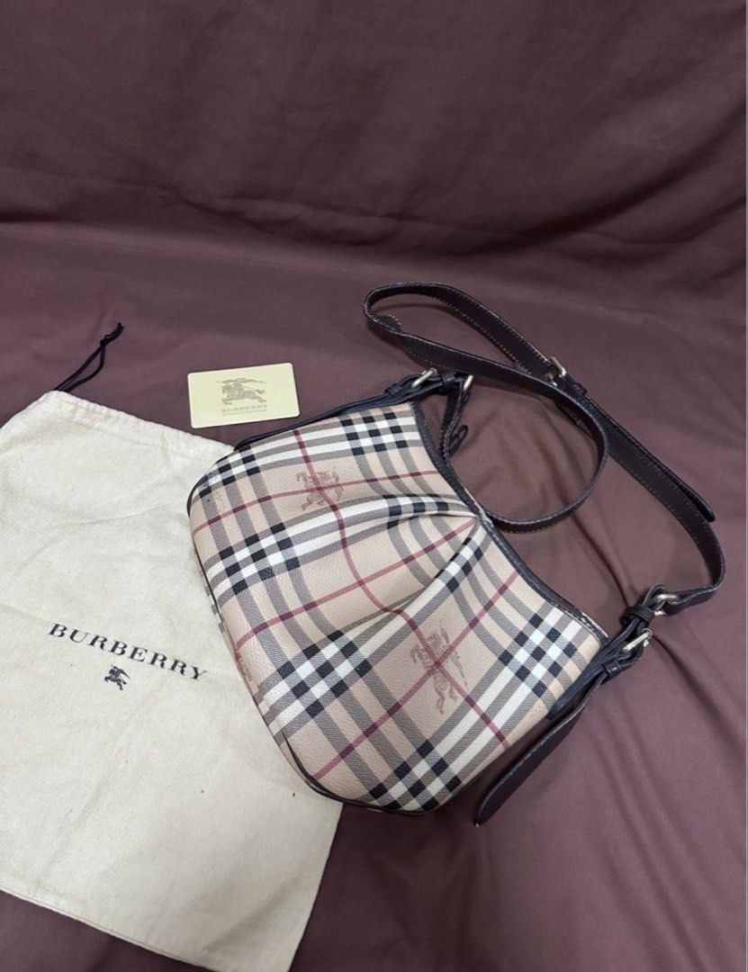 Authentic BURBERRY Sling Bag (Category: Luxury Bags & Wallets) located in Cavite. Submitted by trendydotnet (Listing ID 1467169299, Image 1). Description: READ BELOW! SWIPE➡️ PHOTO DETAILS 🔍ITEM GUARANTEED 💯% AUTHENTIC Authentic BURBERRY Sling Bag - with Dust Bag and Burberry Card - Clean Interior - Zipper pull still intact - No stickiness - Please see photo for bag condition - Bought in Singapore - Not for fussy buyer **Color may vary due to l