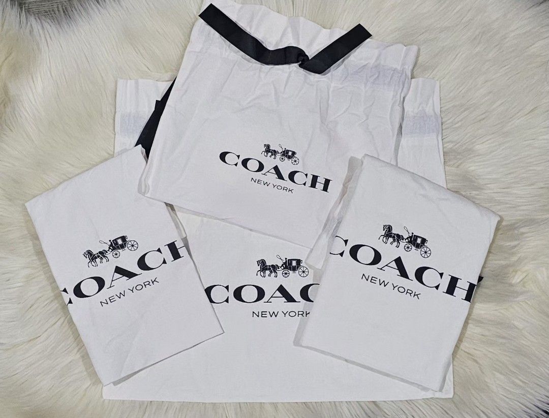 Authentic Coach New York White Dust Bags (Category: Luxury Bags & Wallets) located in Cavite. Submitted by maeforbes031863 (Listing ID 1467340672, Image 1). Description: - 100% Authentic Coach New York white dust bags - Features the classic black drawstrings and signature horse and carriage logo - Available in multiple sizes for handbags and accessories - Perfect for storage, travel, or keeping your collection dust-free.
