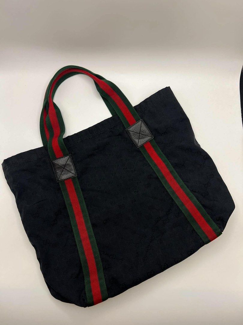Authentic Gucci web tote (Category: Tote Bags) located in Cagayan de Oro. Submitted by borse_de_amore (Listing ID 1467266470, Image 2). Description: Authentic Gucci web tote Rank B signs of use. Clean interior. Minimal rubs but barely noticeable. Vibrant and clear pa GG Logos. Fits Large laptops 🏷️8,800 only.