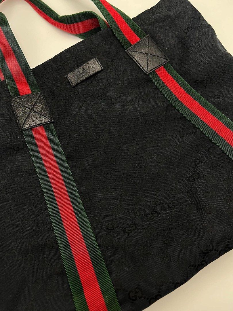Authentic Gucci web tote (Category: Tote Bags) located in Cagayan de Oro. Submitted by borse_de_amore (Listing ID 1467266470, Image 3). Description: Authentic Gucci web tote Rank B signs of use. Clean interior. Minimal rubs but barely noticeable. Vibrant and clear pa GG Logos. Fits Large laptops 🏷️8,800 only.