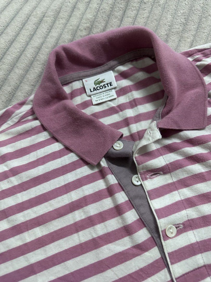 Authentic Lacoste Pink Striped Polo Shirt Size 5 (Category: Tshirts & Polo Shirts ) located in Quezon City. Submitted by lovedbymari (Listing ID 1467284367, Image 2). Description: - Authentic Lacoste striped polo shirt in pink and white - Size: 5 (tag on collar) - Classic collar neck with a 3-button placket - Iconic embroidered crocodile logo on the chest - Soft and comfortable cotton knit material - Designed in France, made in Peru.