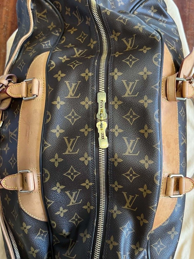 Authentic Louis Vuitton Monogram 50 eole Rolling Duffel Bag (Category: Luxury Bags & Wallets) located in Manila. Submitted by momshei123 (Listing ID 1467174598, Image 3). Description: - PreLoved Authentic Louis Vuitton rolling duffel in iconic monogram canvas - Genuine vachetta leather trim and sturdy top handles with a nice honey patina - Smooth retractable handle system and durable wheels for easy travel - Secure double zipper closure with a co