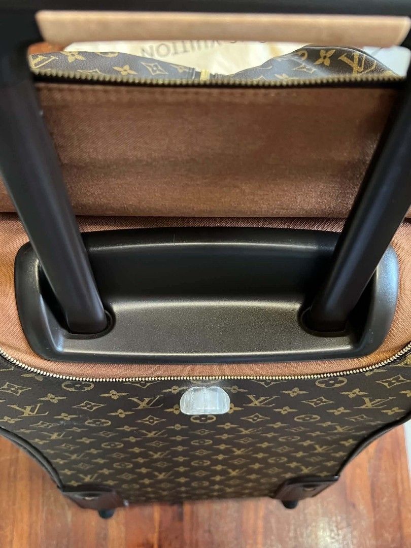 Authentic Louis Vuitton Monogram 50 eole Rolling Duffel Bag (Category: Luxury Bags & Wallets) located in Manila. Submitted by momshei123 (Listing ID 1467174598, Image 2). Description: - PreLoved Authentic Louis Vuitton rolling duffel in iconic monogram canvas - Genuine vachetta leather trim and sturdy top handles with a nice honey patina - Smooth retractable handle system and durable wheels for easy travel - Secure double zipper closure with a co