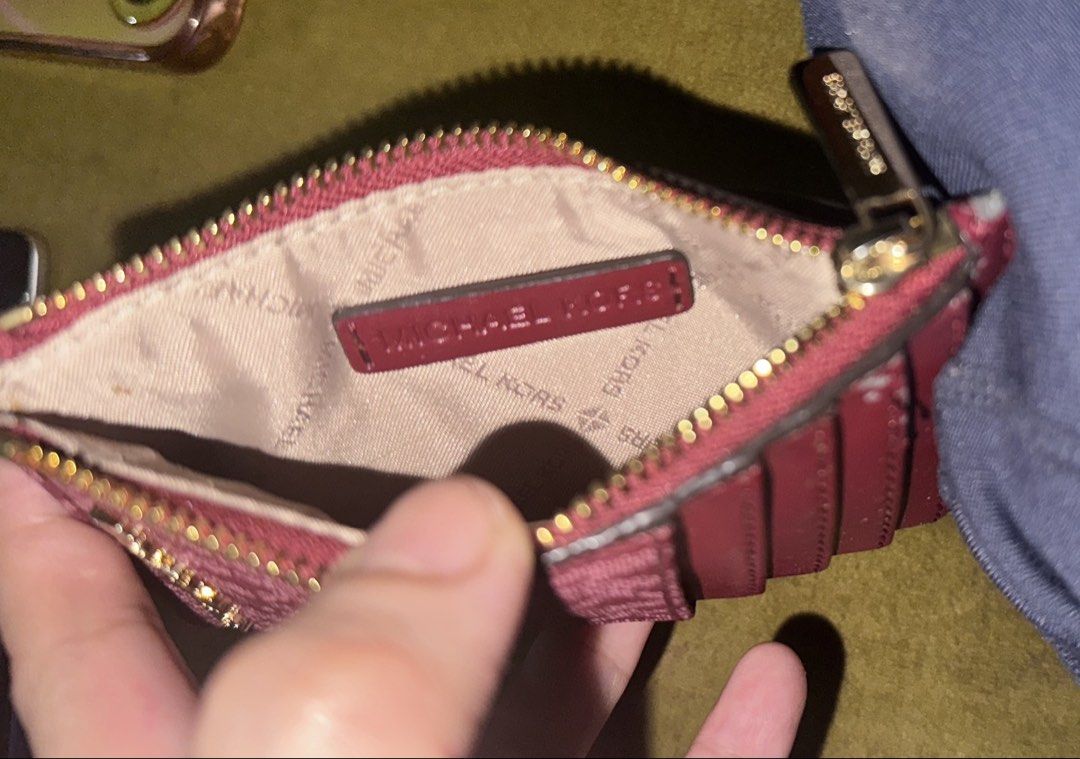 Authentic Michael Kors Card Wallet (Category: Wallets & Card holders) located in Imus. Submitted by sheikas (Listing ID 1467208085, Image 3). Description: Authentic Leather MK Card Wallet Cherry red very nice color. Padala from states Lightly used RFS: not using it nakatambak lang. #michealkors #wallet #mkwallet.