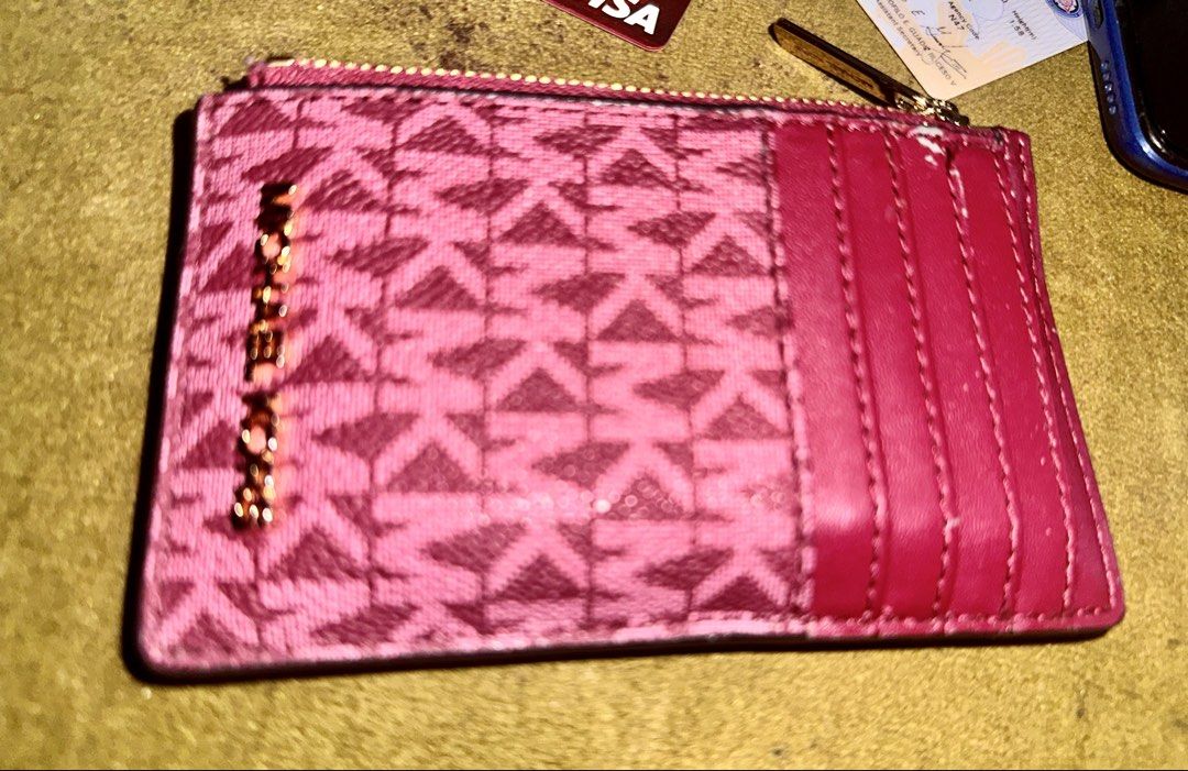 Authentic Michael Kors Card Wallet (Category: Wallets & Card holders) located in Imus. Submitted by sheikas (Listing ID 1467208085, Image 1). Description: Authentic Leather MK Card Wallet Cherry red very nice color. Padala from states Lightly used RFS: not using it nakatambak lang. #michealkors #wallet #mkwallet.