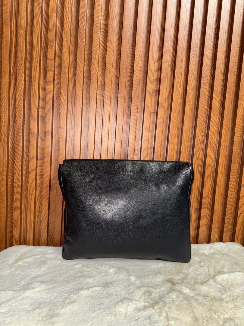 Authentic Mulberry Black Leather Envelope Clutch Bag (Category: Luxury Bags & Wallets) located in Subic. Submitted by luxshoppe88 (Listing ID 1467192260, Image 3). Description: - Authentic Mulberry clutch in premium black grained leather - Envelope flap closure with secure silver-tone metal turnlock - Clean black fabric interior with a convenient slip pocket - Features signature Mulberry tree logo patch and fob - Sleek, minimalist design ideal fo