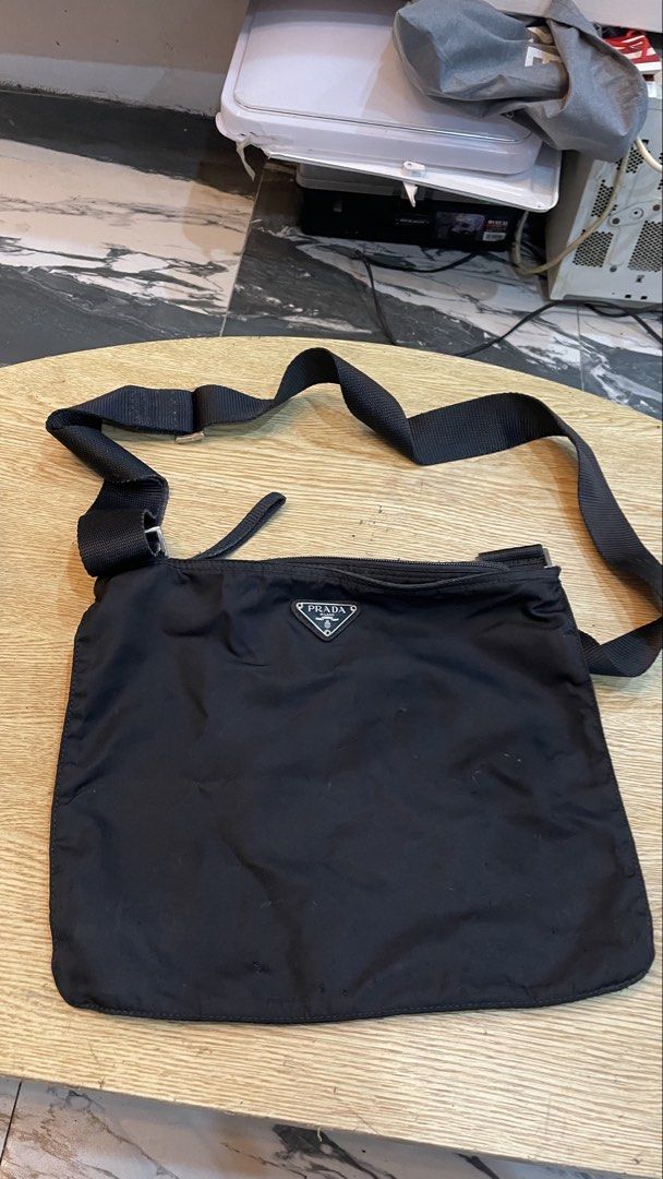 Authentic prada sling bag (Category: Luxury Bags & Wallets) located in Cavite. Submitted by ohmie23 (Listing ID 1467255731, Image 1). Description: Authentic prada sling bag.