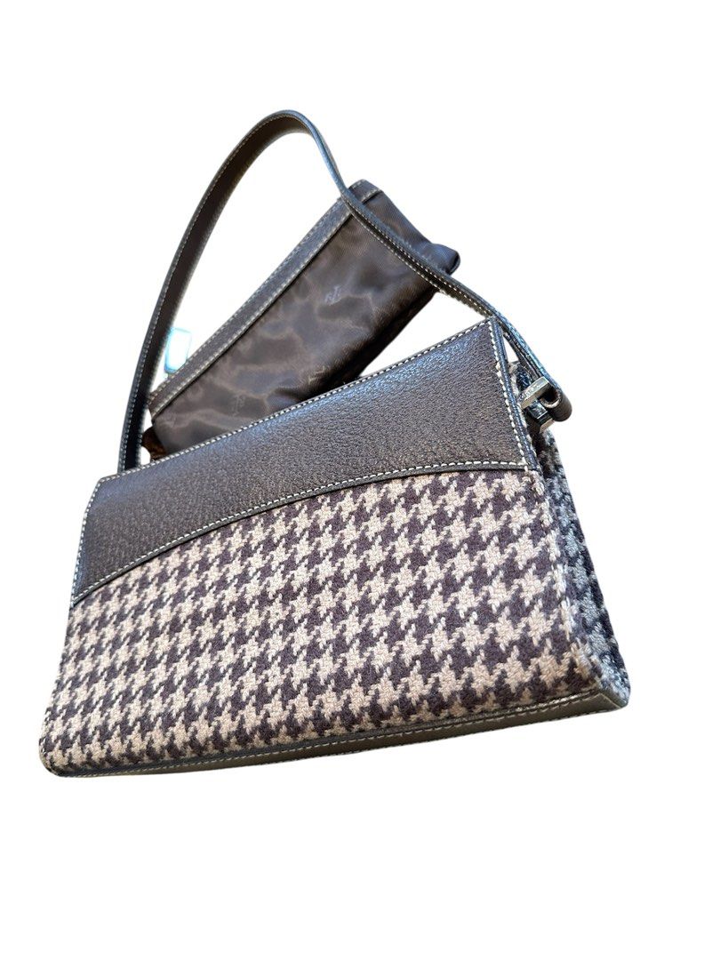 Authentic RL Houndstooth Classic Designer Limited Edition (Category: Luxury Bags & Wallets) located in Muntinlupa City. Submitted by alabangbargains (Listing ID 1343070989, Image 1). Description: Authentic Ralph Lauren Materials: genuine leather, houndstooth print wool-like material Size: see last photo swipe to the left Interior: very clean RL hologram nylon one zipped pocket with detachable extra zipped pouch Closure: none open easy access smal