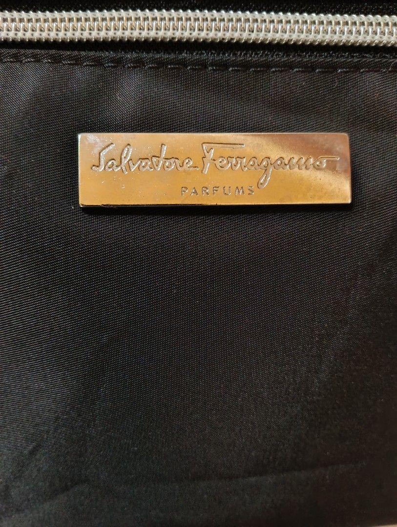 AUTHENTIC SALVATORE FERRAGAMO PARFUMS POUCH (Category: Luxury Bags & Wallets) located in Cagayan de Oro. Submitted by warmbird-f84aab (Listing ID 1467215701, Image 2). Description: ✅ Genuine Ferragamo Parfums item ✅ Made in Italy 🇮🇹 ✅ Material: 100% Polyester ✅ Smooth black fabric | Silver-tone hardware & zipper ✅ Spacious & lightweight — perfect for makeup, toiletries, travel essentials ✅ Clean, excellent condition — barely used! 📌 No return 