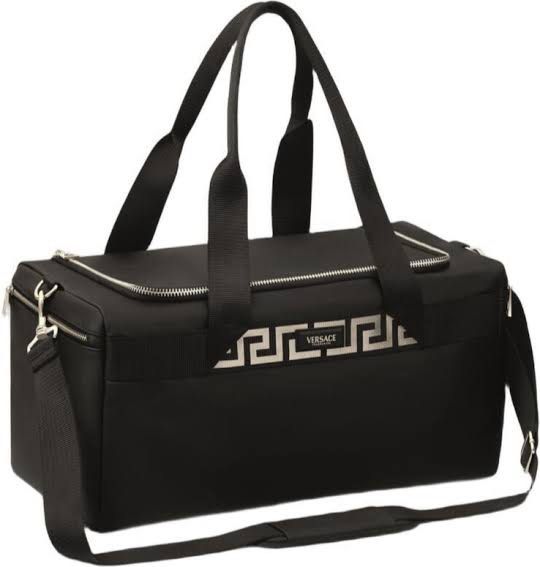 Authentic Versace Black Travel Duffle Bag (Category: Luxury Bags & Wallets) located in Manila. Submitted by cheesetinefinds (Listing ID 1467358074, Image 1). Description: - Authentic Versace travel duffel bag in classic black - Eye-catching white geometric Greek key ribbon detail on the front - Spacious interior ideal for gym sessions, daily use, or weekend trips - Secure dual-zip top opening - Equipped with strong black carrying handles and an a