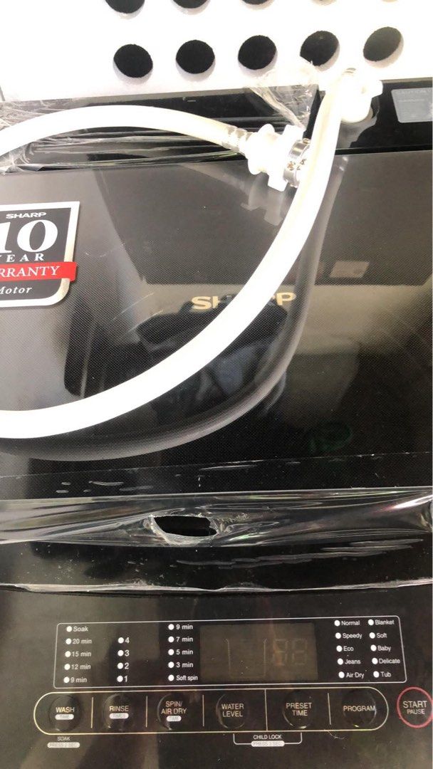 Automatic Washing Machine (Category: Other Home Appliances) located in Taguig. Submitted by unohanselpretzel (Listing ID 1467172002, Image 2). Description: RUSH SALE: Sharp 7.0 kg Automatic Washing Machine Price: ₱5,000 (Negotiable) 📌 Brand: Sharp 📌 Capacity: 7.0 kg 📌 Type: Fully Automatic Top Load RFS: Moving to a new place. Please manage your expectations. The unit has been sitting in a corner for quite some time and has accumulated dust, so