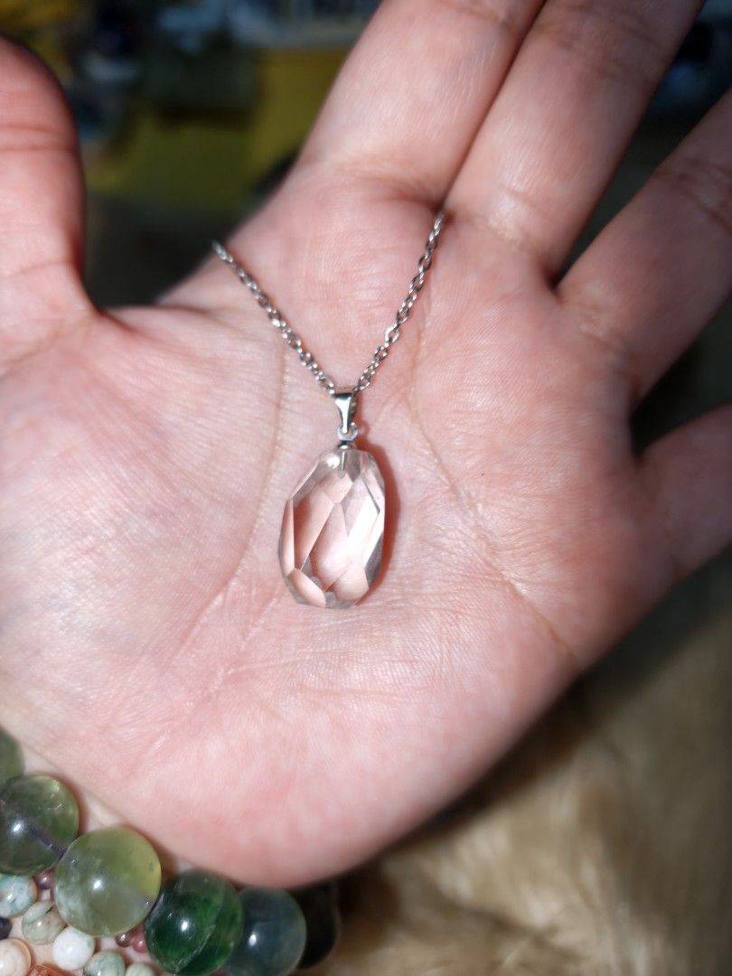 Azeztulite Pendant (Category: Necklaces) located in Quezon City. Submitted by piaoliangcollections.ph (Listing ID 1467252312, Image 2). Description: Have this rare piece for 3K. Azeztulite is a high-vibration trade name for pure quartz (SiO₂) often used in alternative healing and meditation practices. Spiritual Awakening: Stimulates the Third Eye, Crown, and higher chakras to heighten intuition, inner vision, and cosmic awareness. Meditation and 