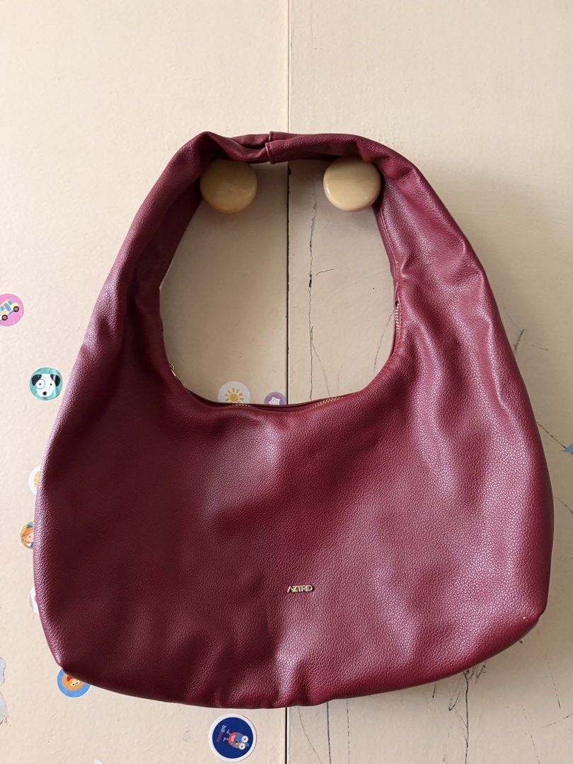 Aztrid Medium Shoulder Bag Burgundy Red (Category: Shoulder Bags) located in Pasay City. Submitted by ellen10131995 (Listing ID 1467231980, Image 2). Description: - Brand: Aztrid - Color: deep burgundy - Size: Medium (fits an iPad easily) - Material: Soft pebble-textured faux leather - Closure: Secure zip top - Hardware: Elegant gold-toned brand logo - Interior: Clean lining - Inclusion: Original black Aztrid storage box #bagforsale #bagsph.