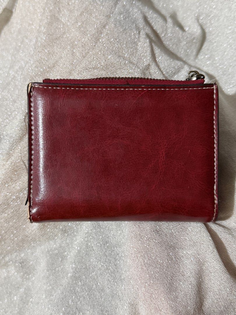 Baellery Red Trifold Wallet (Category: Wallets & Card Holders) located in Manila. Submitted by ninib33 (Listing ID 1467263546, Image 2). Description: selling low bcs of the issues (see photos) working zipper.