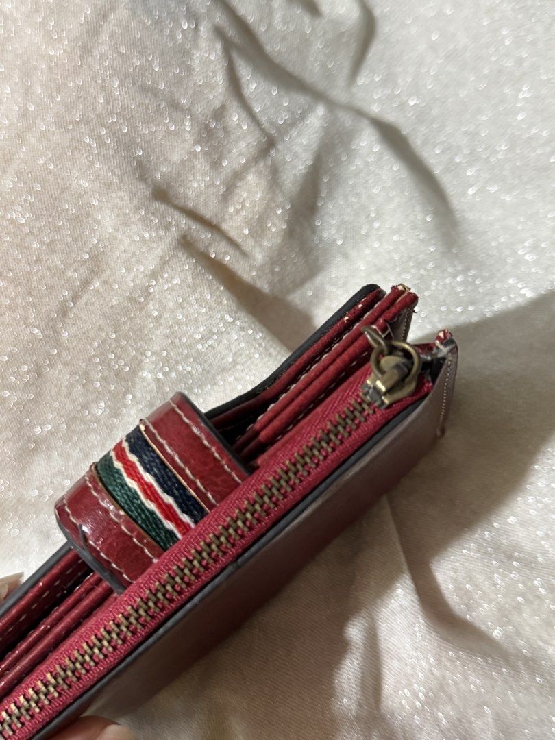 Baellery Red Trifold Wallet (Category: Wallets & Card Holders) located in Manila. Submitted by ninib33 (Listing ID 1467263546, Image 3). Description: selling low bcs of the issues (see photos) working zipper.