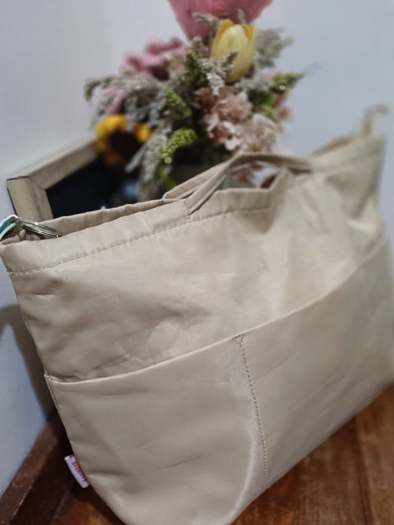 BagINBAG multi-pocket organizer (Category: Purses & Pouches) located in Bocaue. Submitted by bags.and.beyond (Listing ID 1467335241, Image 2). Description: Pls check photos for details. Delivery via J&T or Lalamove Payment first thru gcash or bank transfer.