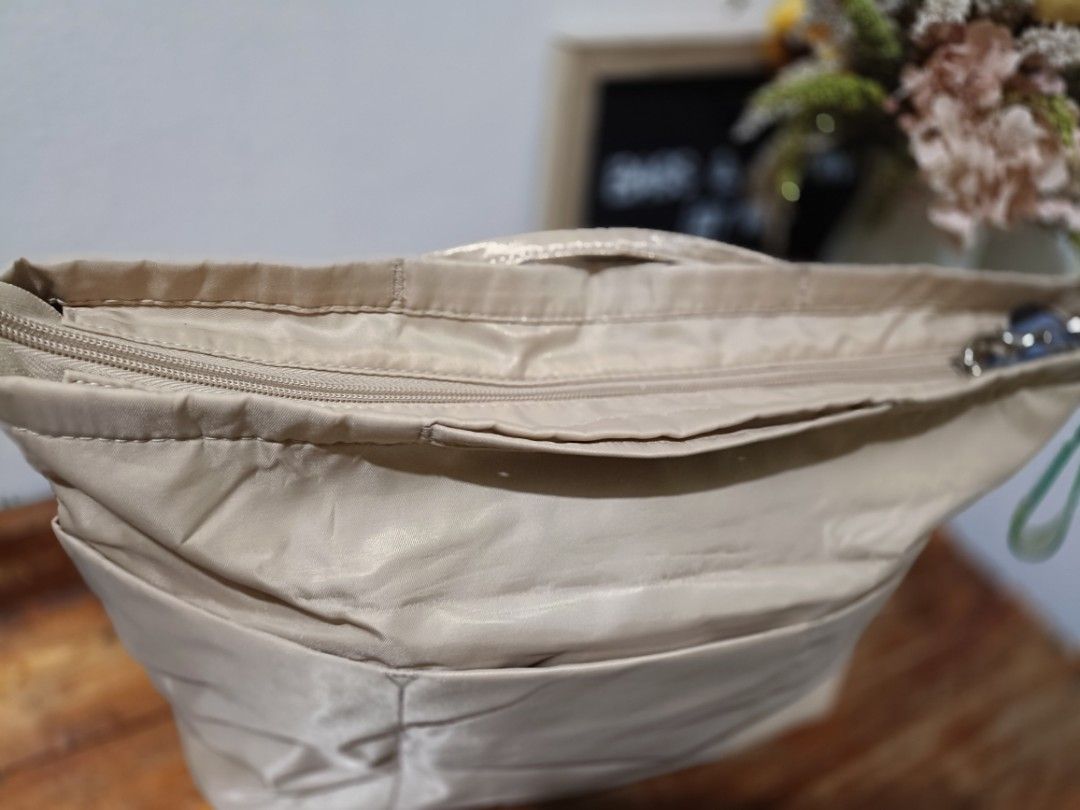 BagINBAG multi-pocket organizer (Category: Purses & Pouches) located in Bocaue. Submitted by bags.and.beyond (Listing ID 1467335241, Image 3). Description: Pls check photos for details. Delivery via J&T or Lalamove Payment first thru gcash or bank transfer.