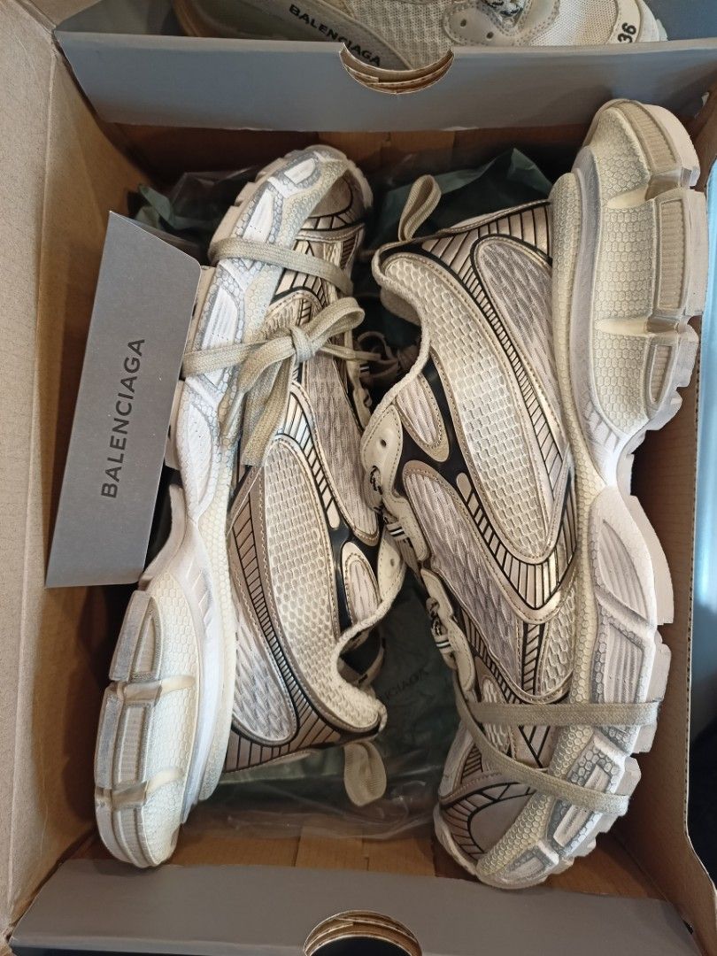 Balenciaga Runner Sneakers White Silver Size 36 (Category: Sneakers) located in Naga. Submitted by primo9 (Listing ID 1467183285, Image 1). Description: - Brand: Balenciaga - Model: Runner Sneakers - Color: White and Silver - Size: 44 men - Condition: Fresh pair, extremely clean uppers and soles - Design: Chunky mesh with metallic panels and rubber details - Inclusions: Original box and Balenciaga branded envelope - Style: Statement chunky kicks.