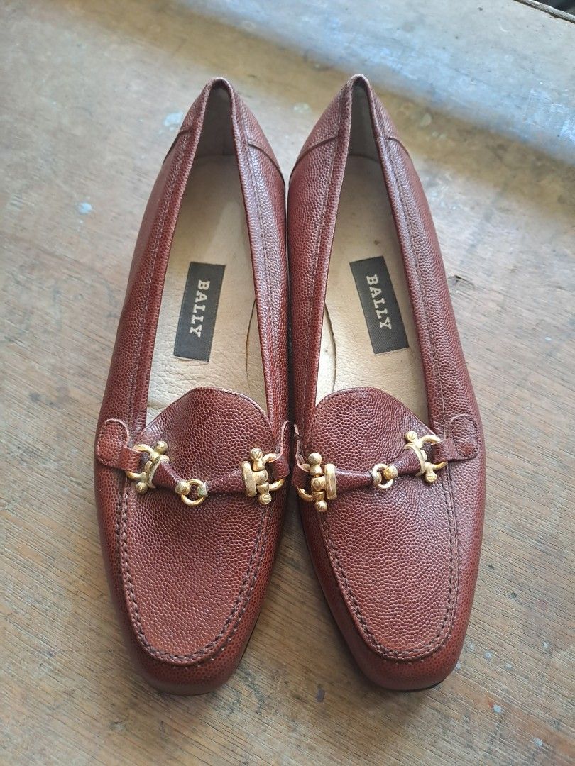 Bally Brown Leather Horsebit Loafers (Category: Loafers) located in Puerto Princesa. Submitted by jercksthriftph (Listing ID 1467362362, Image 1). Description: - Brand: Bally (Model: Eunice) - Style: Brown textured leather horsebit loafers with gold-tone hardware, slip-on design - Made in Italy - Size: 35.5 - Condition: Soles and heels in solid shape; light interior wear near seams - Perfect for work, casual chic, and everyday styling.
