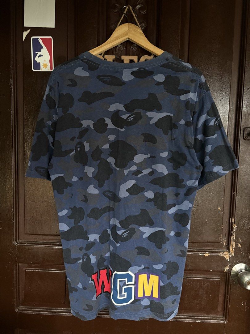 Bape Camou Shark Tee Navy Blue (Category: Activewear) located in Manila. Submitted by bravestone14 (Listing ID 1467288118, Image 2). Description: wts bape camou shark tee blue navy authentic 22x30 no issue color rate 9.2/10 excellent condition 1500+sf 📩.