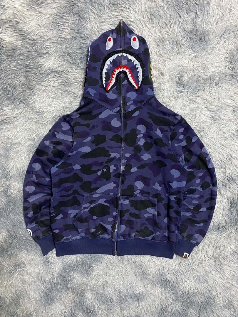 BAPE FULL ZIP (Category: Coats, Jackets and Outerwear) located in Manila. Submitted by aize2thrft (Listing ID 1467220131, Image 1). Description: BAPE FULLZIP HOODIE LIGHTLY USED COMPLETE TAGS 28/24.