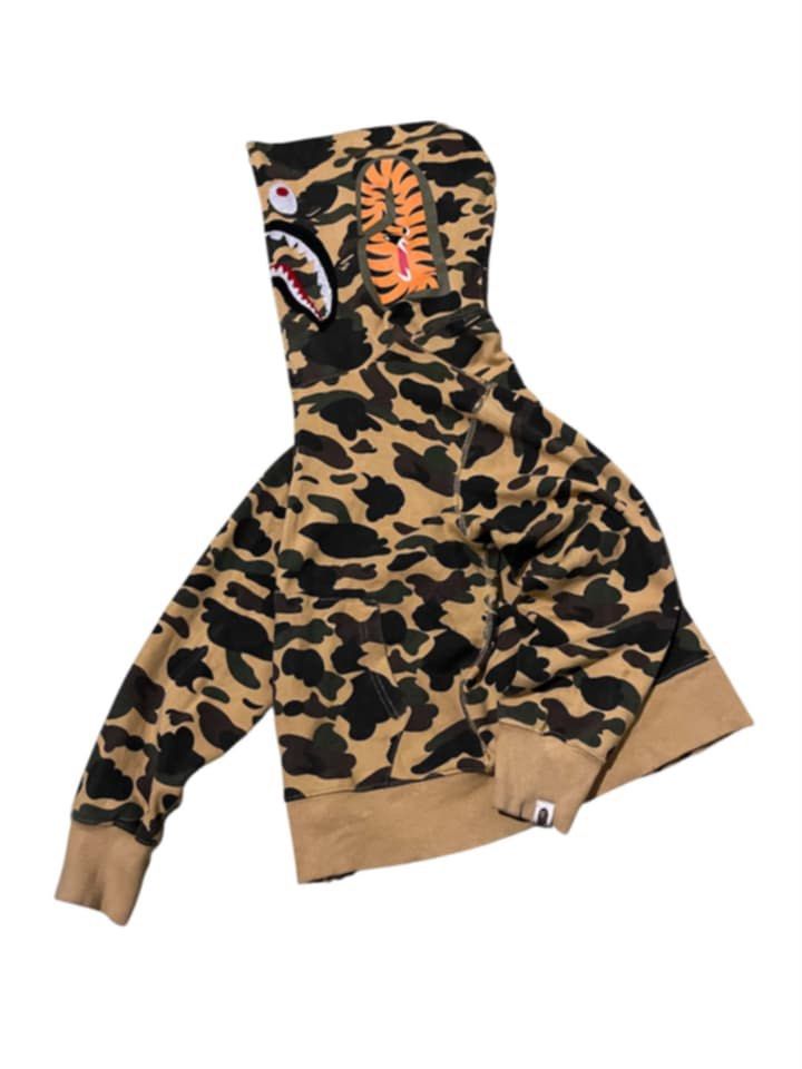 Bape Tiger Camo Hoodie (Category: Coats, Jackets and Outerwear) located in Majayjay. Submitted by puredriponly (Listing ID 1467278636, Image 1). Description: 🔥 BAPE TIGER CAMO HOODIE 🔥 📌 ITEM: Tiger Camo Hoodie 🎨 COLOR: Brown / Black / Tan Camo 🐅 DESIGN: Tiger Graphic + Shark Detail 👕 STYLE: Streetwear / Drip Fit 📦 STATUS: Available / Pre-order 💰 PRICE: ₱980 📏 SIZES: S.