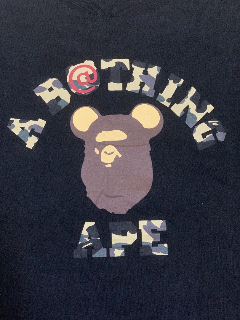BAPE x BEARBRICKS TEE (Category: Tshirts & Polo Shirts ) located in Manila. Submitted by scarlett_hope (Listing ID 1467349500, Image 2). Description: B•PE x BEARBRICK COLLEGE TEE Color: Black L: 27 W: 20 Color rate: 9.8/10 Condition: Excellent DM to purchase 📩 📍Manila.