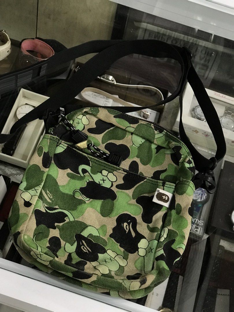 Bape X kaws camou sling bag (Category: Luxury Bags & Wallets) located in Bacolod City. Submitted by dave.tripthrift6100 (Listing ID 1467352191, Image 1). Description: No issue Need wash Buy free shipping.