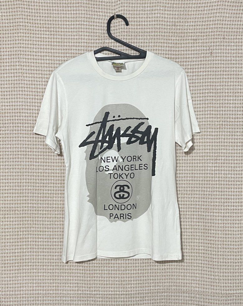 Bape x Stussy (Category: Activewear) located in Liloy. Submitted by juan2thrift (Listing ID 1467306820, Image 1). Description: Bape x Stussy Size M on tags Color Rate - 8/10 (Babad nyo lang sa Ariel) Dimension - 18” by 26” Good Condition Laser Print .