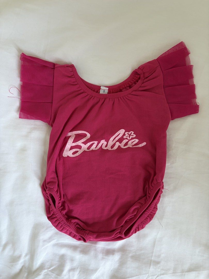 Barbie Baby Onesie (Category: Babies & Kids Fashion) located in Binan City. Submitted by hya.perez (Listing ID 1467188366, Image 1). Description: Used only once. Headband included. Size: 0-6 months.