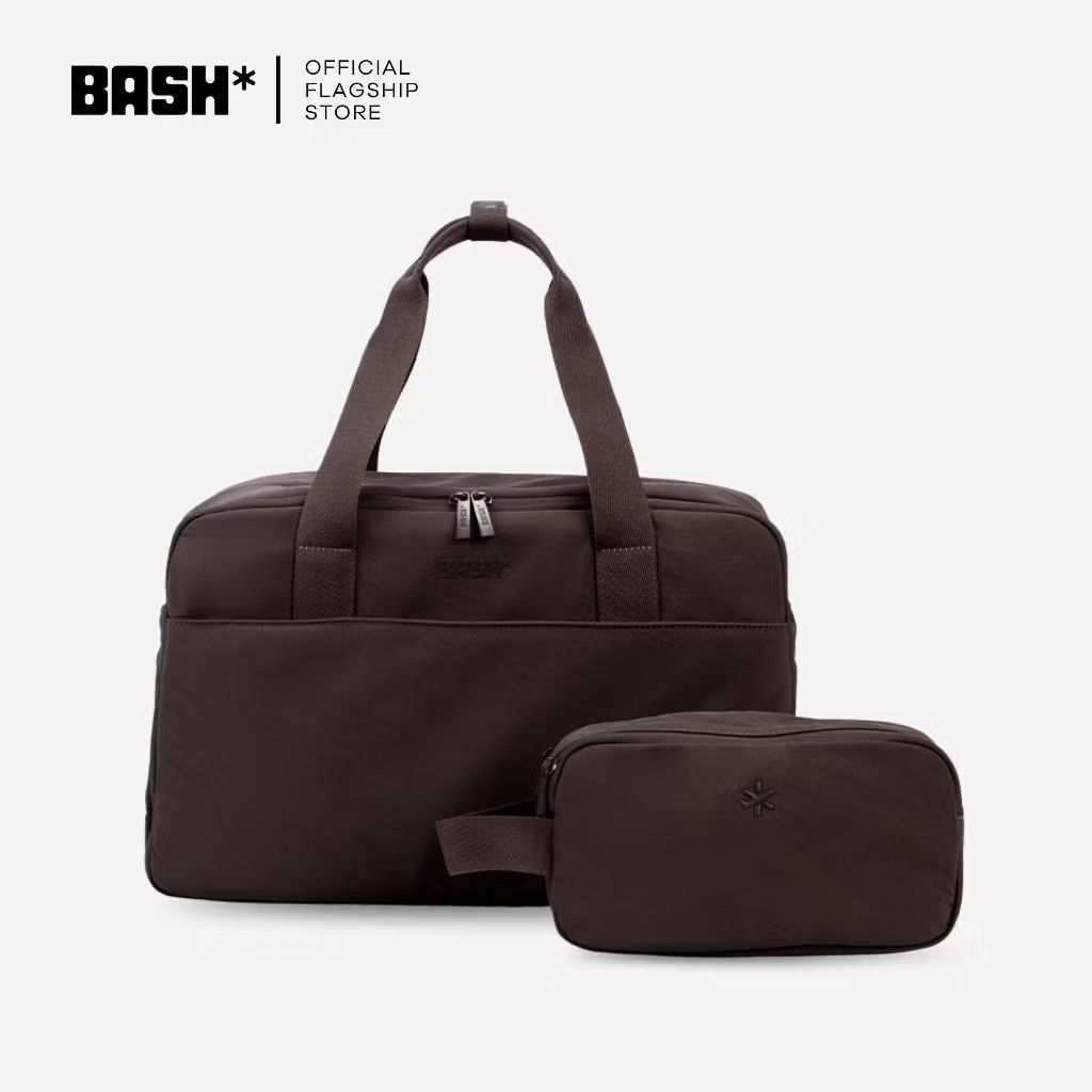 BASH Weekender Mono Terra (Regular size) (Category: Shoulder Bags) located in Caloocan City. Submitted by glynneb (Listing ID 1467327074, Image 1). Description: - Brand: BASH - Color: Terra - Set includes: Large duffel bag and matching zip pouch with wrist strap - Duffel features: Double top handles, dual zipper closure, and smooth material - Pouch : not included - Perfect for: Weekend trips, travel, or gym sessions - Condition: Excellent slightl