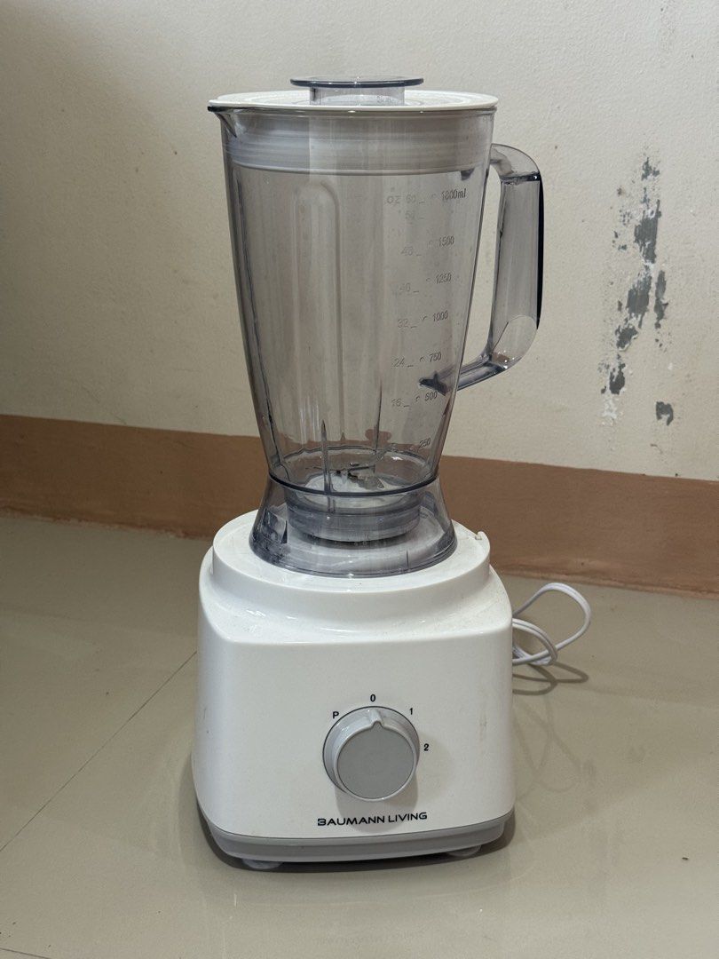 Baumann Living Multi-Functional Food Processor BM-FP4130 (Category: Juicers, Blenders & Grinders) located in Manila. Submitted by regnerron34512 (Listing ID 1467291938, Image 3). Description: - Brand/Model: Baumann Living Multi-Functional Food Processor (BM-FP4130) - Power: 750W motor base with multiple speed settings and pulse function - Capacity: 2L processing bowl and 1.8L blender jar - Included Attachments: Citrus juicer, slicing disc, shredd