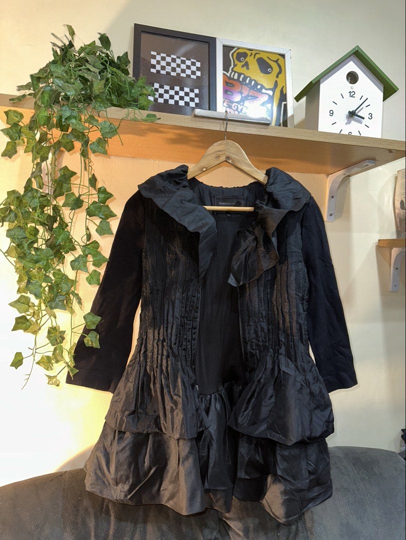 BCBGMAXAZRIA Black Ruffled Zip Jacket Size M (Category: Coats, Jackets and Outerwear) located in Manila. Submitted by tenshiii185 (Listing ID 1467249594, Image 1). Description: - Brand: BCBGMAXAZRIA - Size: Medium (M) - Color: Black - Closure: Full zip front - Design details: Pleated bodice panels, oversized ruffled collar, and puffed hem - Sleeves: Long knit sleeves - Origin: Made in China - Condition: Great for cooler weather and unique style.