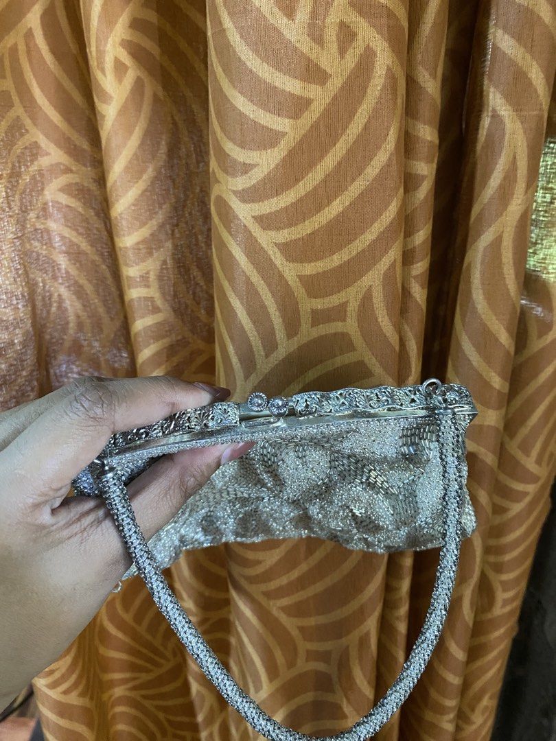 Beaded silver kiss lock bag (Category: Clutches) located in Sorsogon. Submitted by y2k_findsbypearl (Listing ID 1467360695, Image 1). Description: Beaded silver kiss lock bag Good condition no remove beads intack.