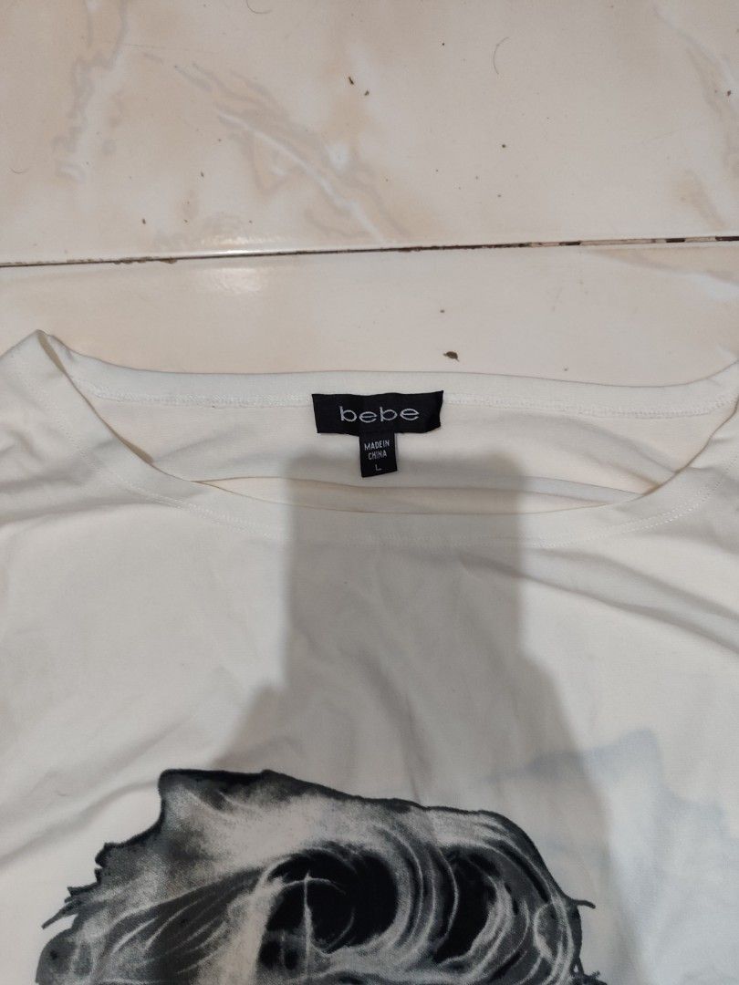 BEBE 2000s MARILYN MONROE GRAPHIC SILK MINI DRESS (Category: Dresses) located in Pagadian. Submitted by miraculouspat (Listing ID 1467277074, Image 3). Description: L 30 W 19 NO ISSUE ASNEW CONDITION MAY NEED WASH LANG BACK TO BACK DESIGN.