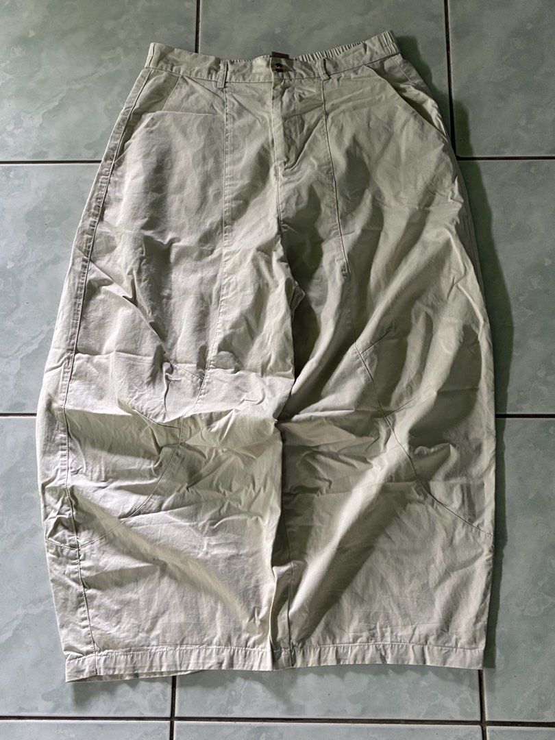Beige Barrel Trousers Elastic Waist (Category: Trousers) located in Batangas. Submitted by jinventoryarchive (Listing ID 1467230419, Image 1). Description: • Waist: 32-35 • Length: 39 • Leg Op: 11 • Thigh: 16 - Style: Streetwear curved leg barrel pants with paneled construction - Waist: Elastic waistband with button closure and zip fly - Pockets: Deep front pockets - Fit: Comfortable relaxed fit - Care: Machine wash cold, hang to dry.