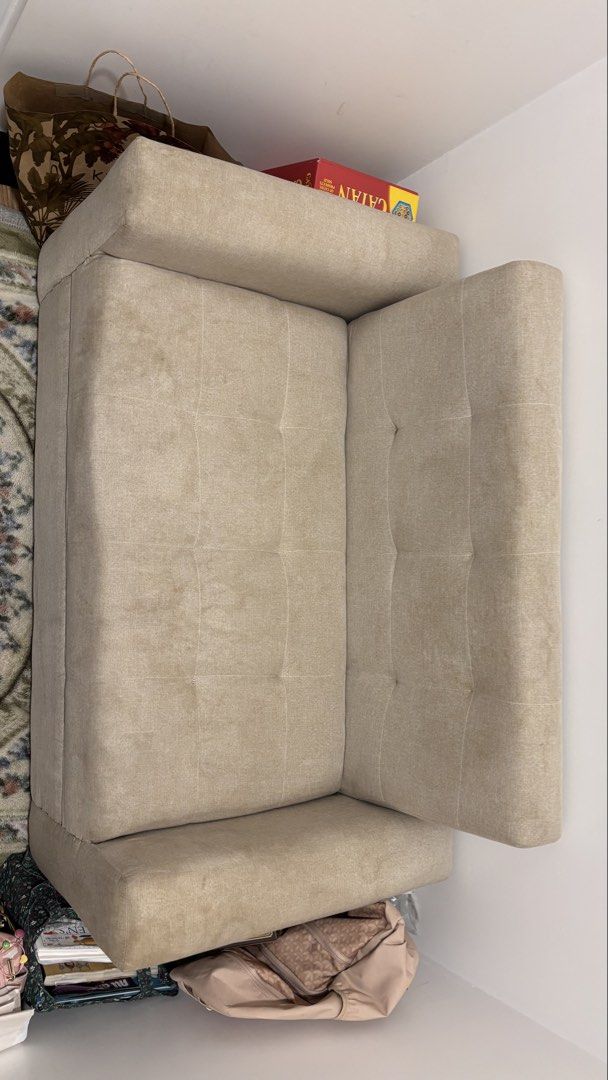Beige Couch with Tufted Backrest (Category: Sofas) located in Quezon City. Submitted by carlosmichael (Listing ID 1467270520, Image 1). Description: Compact beige couch. Neutral fabric works with lots of room setups. Tufted backrest and seat cushions. Wide armrests on both sides. Sturdy build, fits well in small apartments or bedrooms. Clean look, neutral tone. length 122 cm 48 in width 69 cm 27 in.
