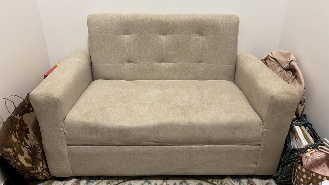 Beige Couch with Tufted Backrest (Category: Sofas) located in Quezon City. Submitted by carlosmichael (Listing ID 1467270520, Image 3). Description: Compact beige couch. Neutral fabric works with lots of room setups. Tufted backrest and seat cushions. Wide armrests on both sides. Sturdy build, fits well in small apartments or bedrooms. Clean look, neutral tone. length 122 cm 48 in width 69 cm 27 in.
