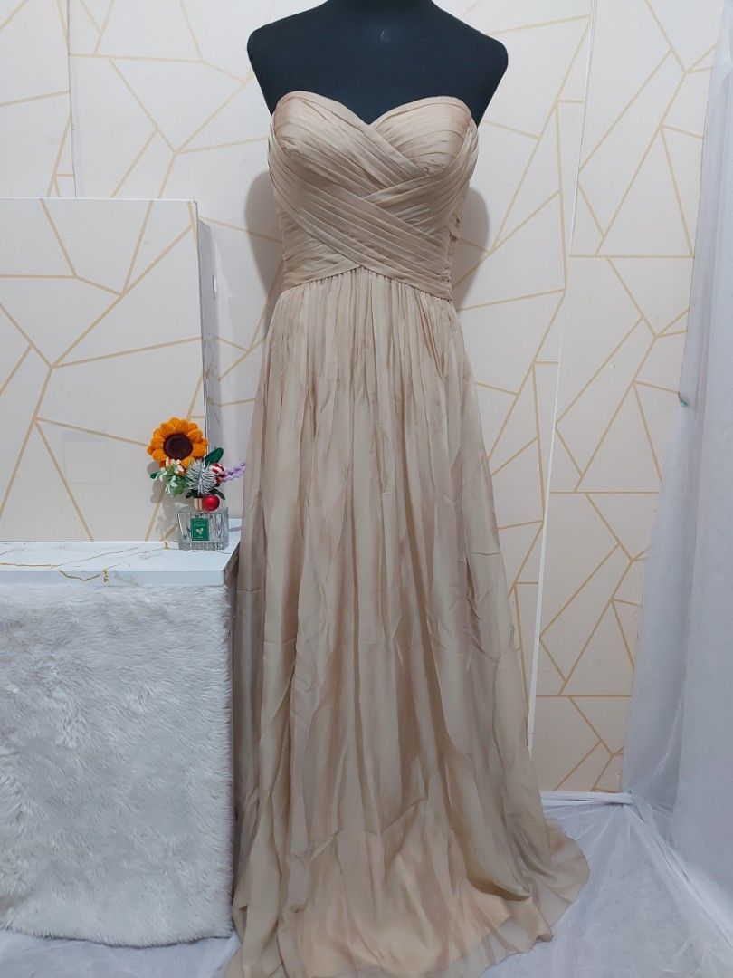 Beige Strapless Gown-US Size: 4 (Category: Evening dresses & gowns) located in Manila. Submitted by jollyann_b1990 (Listing ID 1467261241, Image 3). Description: ✨ AVAILABLE FOR SALE ✨ Perfect for weddings, debuts, prom, pageants & other special occasions. Size: [US Size: 4] Bust: 36 inches Waist: 29 inches Length: 54 inches Color: [BEIGE] Material: [CHIFFON] Condition: [Brand New] 📍 Pasig 🚚 Delivery available 📩 Send us a message for availabil