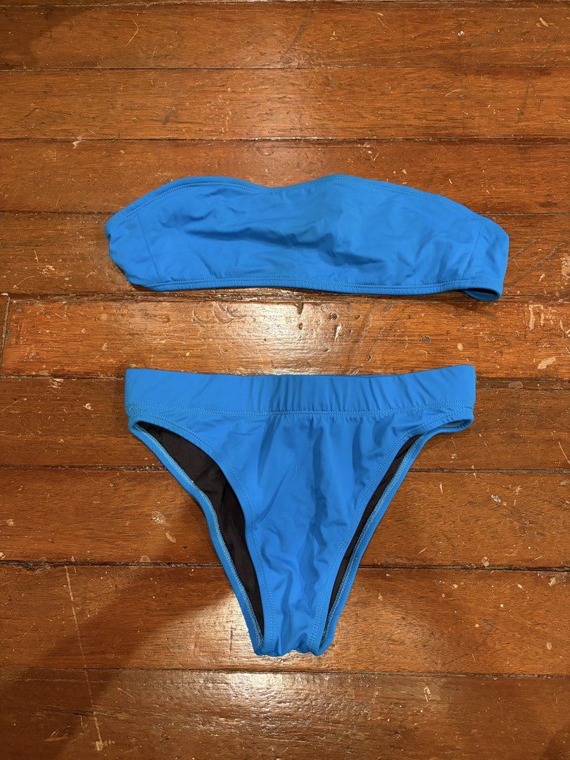 Beyond the beach Two-Piece Bandeau Bikini Set (Category: Bikinis & Swimsuits) located in Makati City. Submitted by margaaa01 (Listing ID 1467313227, Image 2). Description: - Color: Vibrant blue - Style: Two-piece bandeau and high-waisted swimsuit - Top: Strapless cut - Bottoms: Comfortable elastic waistband - Lining: Fully lined interior in black - Condition: Clean, well-maintained, and ready for summer.