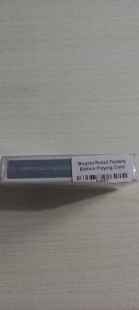 Bicycle Robot Factory Edition Playing Cards (Category: Board Games & Puzzles) located in Pasig City. Submitted by j-fri0127 (Listing ID 1467175758, Image 3). Description: - Brand: Bicycle Robot Factory Edition - Condition: Brand new, factory sealed in original plastic with a clear protective case - Design: Intricate grey and blue mechanical robot graphics - Size: Standard poker size - Ideal for: Card games, magic tricks, and cardistry collections