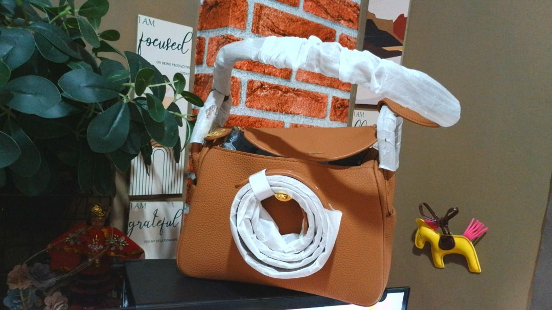 BKK Lindy (Category: Cross-body Bags) located in Binan City. Submitted by 11eleven.shop (Listing ID 1467332757, Image 3). Description: Colors Available: Tan, Taupe, and Grey 2 straps included Free horse bag pendant - different color available.