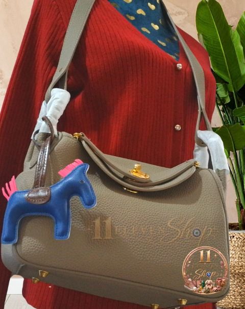 BKK Lindy (Category: Cross-body Bags) located in Binan City. Submitted by 11eleven.shop (Listing ID 1467332757, Image 1). Description: Colors Available: Tan, Taupe, and Grey 2 straps included Free horse bag pendant - different color available.