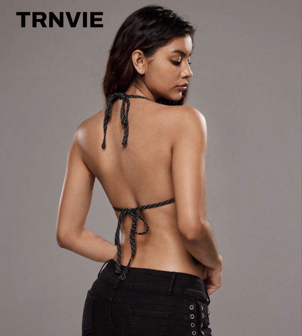 Black and White Striped Halter Top Backless Crop (Category: Sleeveless) located in Caloocan City. Submitted by lysomuch (Listing ID 1467264534, Image 2). Description: - Cut: Deep V-neck front and fully open back - Fit: Adjustable tie straps at the neck and lower back - Never been used!.